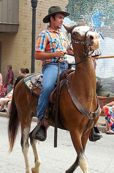 man on a horse in a costa rican parade